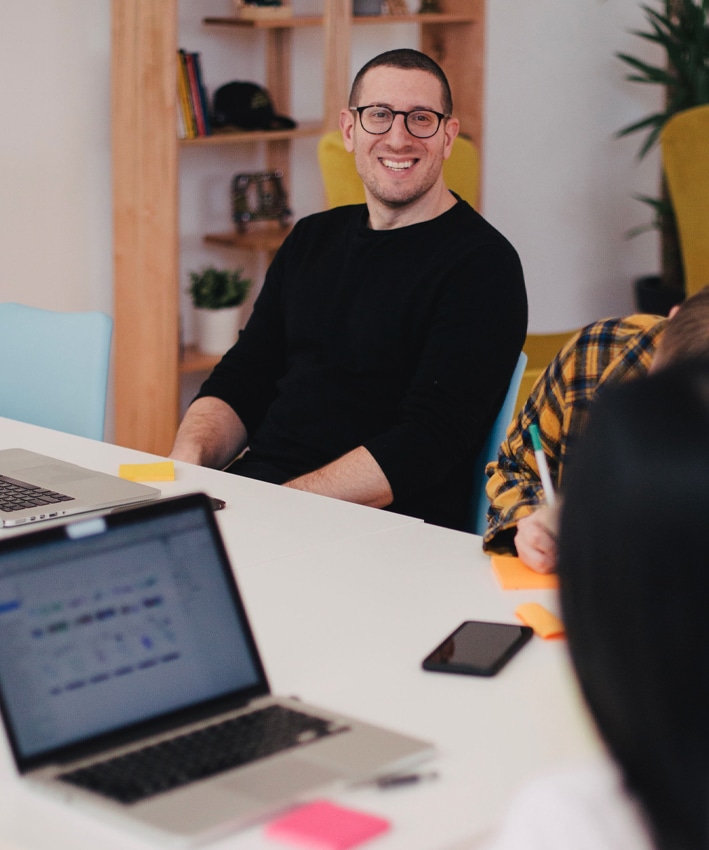 Team collaboration on CX innovation, AI-driven customer experience, and leadership alignment strategies